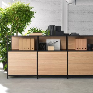 Flip-top power unit open on a Pigreco meeting table