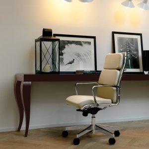 Pad arm pads upholstered in leather on The Season