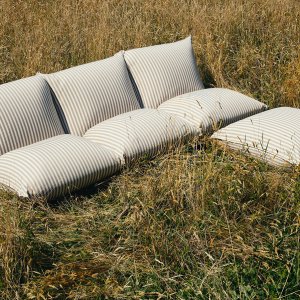 Brezza outdoor furniture in a landscaped courtyard