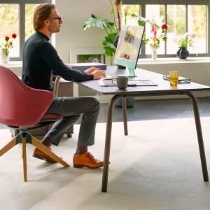 Knitted membrane back with built-in armrests on the se:flair by Sedus