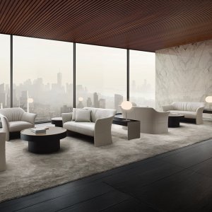Tall Sella side table next to the lounge armchair