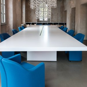 Solenoids side tables by Tecno beside the Asymmetrical desk