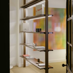 Floor to ceiling Cosmos bookshelf with flap fronts and drawers
