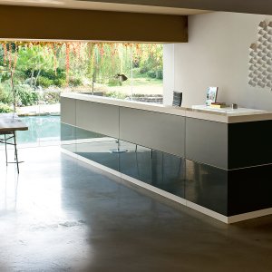 Front finishing panel of the Vogue reception desk hooked onto the structure