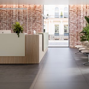 Identical Z2 by Quadrifoglio modules repeated across a wide reception counter