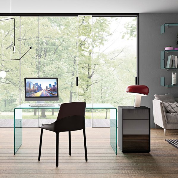 FIAM curved-glass table in a premium interior