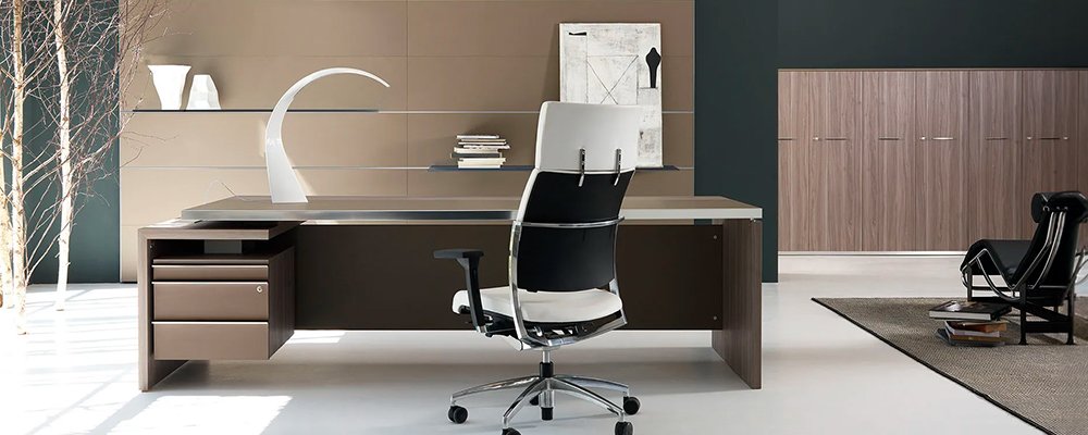 Desk with integrated pedestal